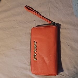 Betsy Johnson coral wallet.